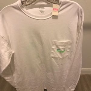 Ladies long sleeved Pink shirt in size x small